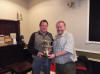 club championship winner Whitby Moynan receiving the Order of Malta cup from club chairman Bill Ryan.